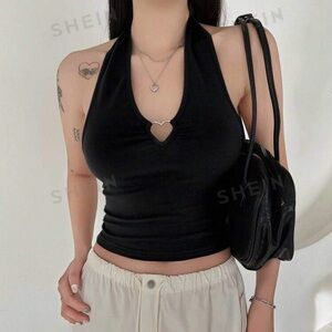 Black crop with heart detail